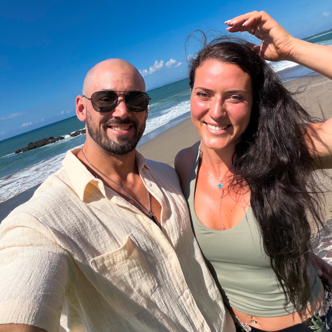 Dom and partner on the beach